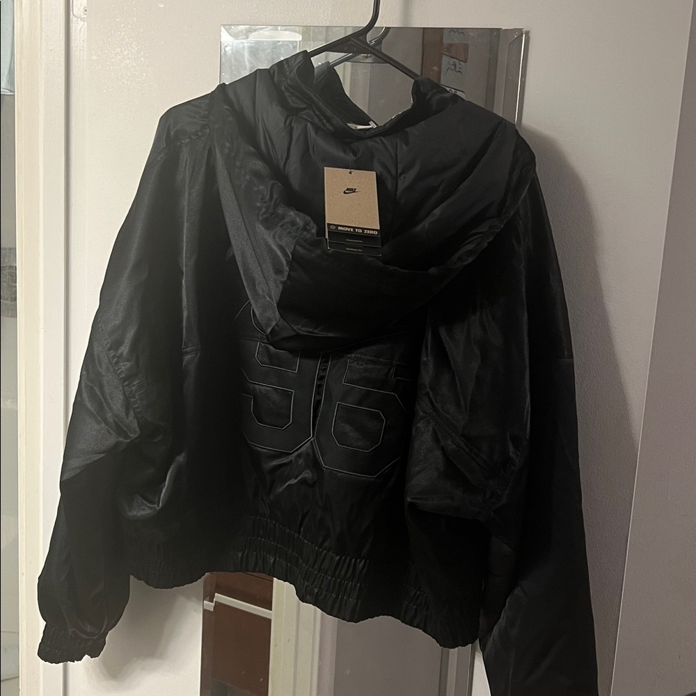 Nike Women's Black shiny pullover light Jacket